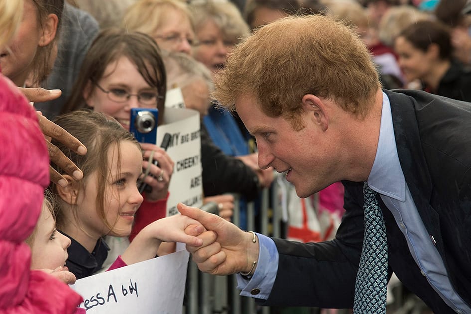 Britain's Prince Harry, shakes hands with a young girl while visiting the War Memorial Centre in Whanganui, New Zealand.