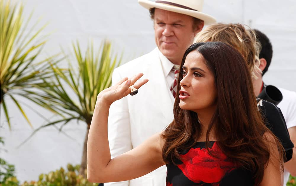 Actors Salma Hayek and John C. Reilly arrive for a photo call for the film Tale of Tales, at the 68th international film festival, Cannes, southern France.