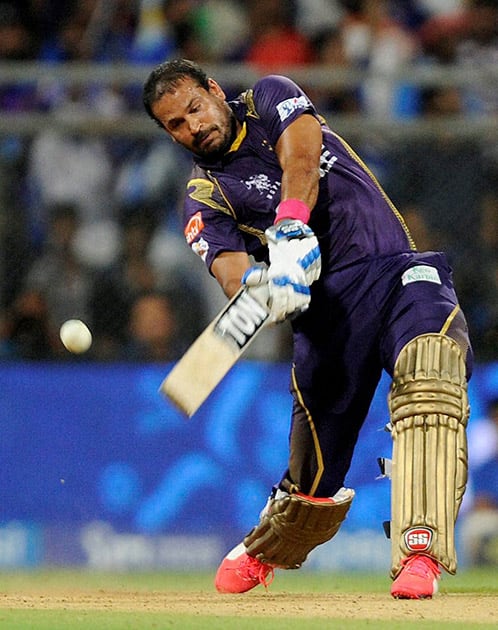 Yusuf Pathan of Kolkata Knight Riders plays a shot against Mumbai Indians during an IPL T20 match in Mumbai .