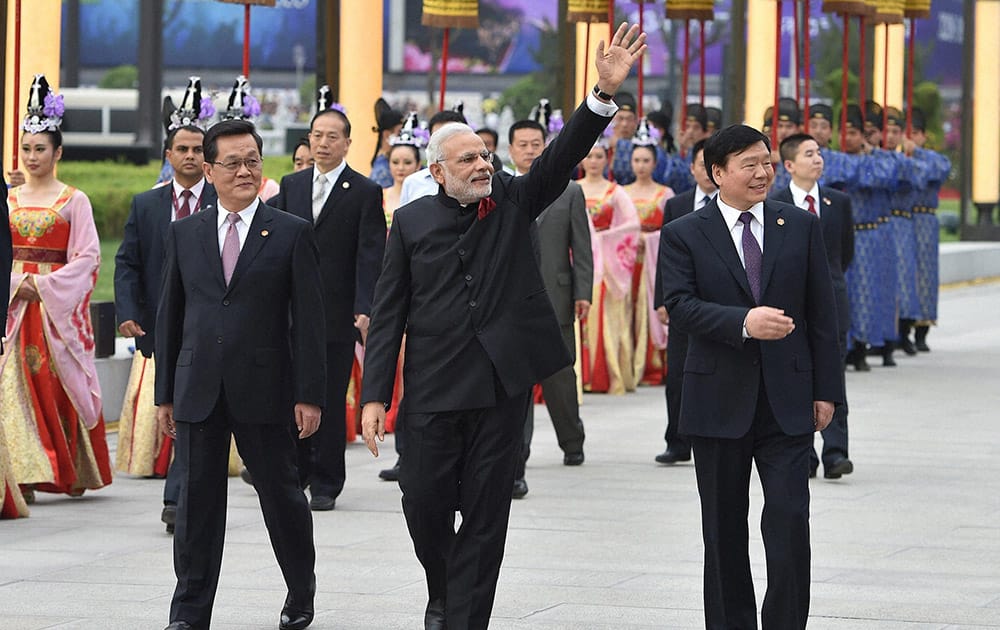 Prime Minister Narendra Modi during the traditional Tang Dynasly, welcome cermony of South City Wall in Xian,China.