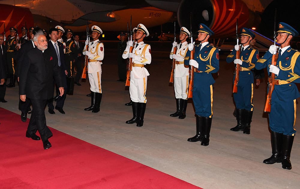 Prime Minister Narendra Modi being welcomed on his arrival at Beijing airport in China.