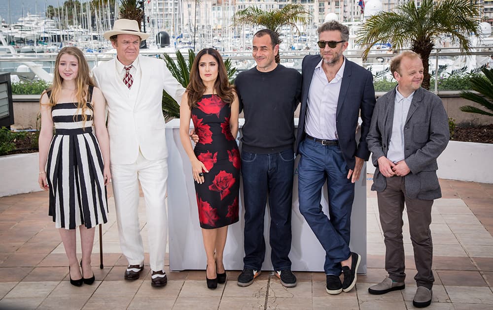 Bebe Cave, John C. Reilly, Salma Hayek, director Matteo Garrone, Vincent Cassel and Toby Jones from left to right pose for photographers during a photo call for the film Tale of Tales, at the 68th international film festival, Cannes, southern France.