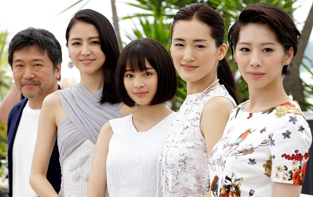 Director Hirokazu Kore-Eda, Masami Nagasawa, Suzu Hirose, Haruka Ayase, and Khao pose for photographers during a photo call for the film Our Little Sister, at the 68th international film festival, Cannes, southern France.