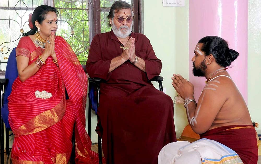 Vinod Khanna and his wife Kavitha perform a puja to celebrate their 25th wedding anniversay in Bengaluru.