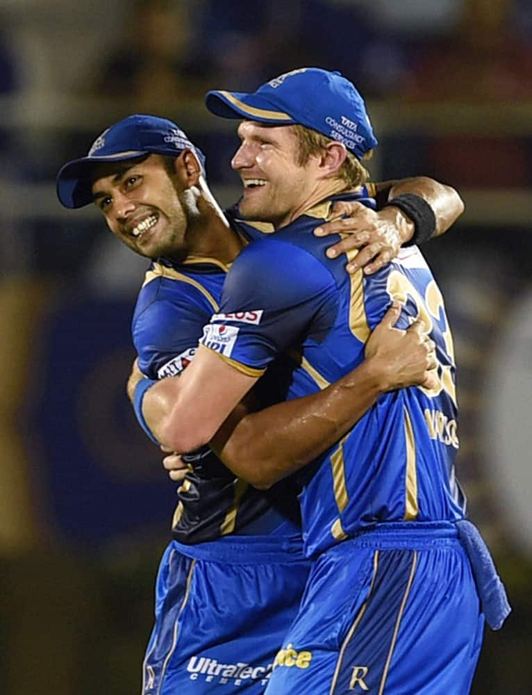 Rajasthan Royals players Shane Watson and Stuart Binny celebrate thier victroy against Kolkata Knight Riders in Mumbai.