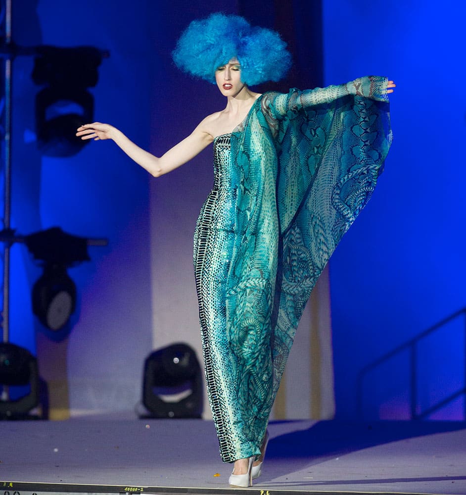 A model presents couture by Jean Paul Gaultier during a fashion show at the opening ceremony of the Life Ball in front of City Hall in Vienna, Austria.