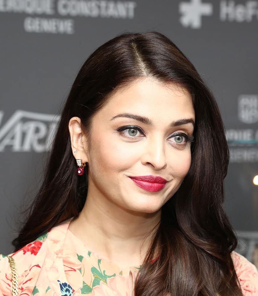 Aishwarya Rai Bachchan poses for photographers on arrival at the Variety and UN Women Panel discussion, during the 68th international film festival, Cannes