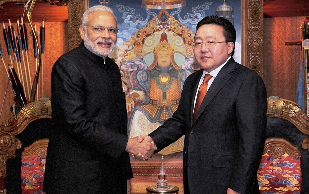 Prime Minster Narendra Modi shakes hands with President of Mongolia Tsakhiagiin Elbegdorj in Ulan Bator, Mongolia.