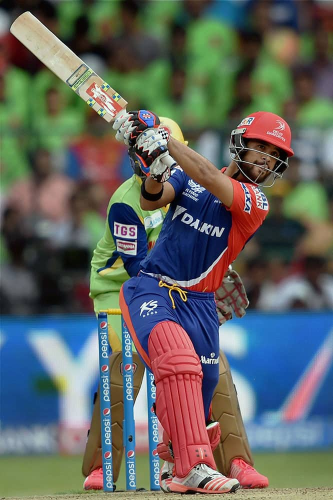 Delhi Daredevils J P Duminy plays a shot during IPL8 match against Royal Challengers Bangalore in Bengaluru.