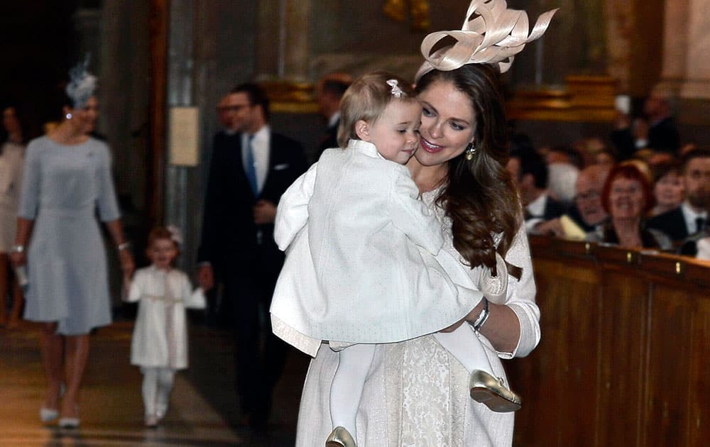 Sweden's Princess Madeleine and her daughter Leonore arrive for a service in the Royal Chapel in Stockholm, Sweden.