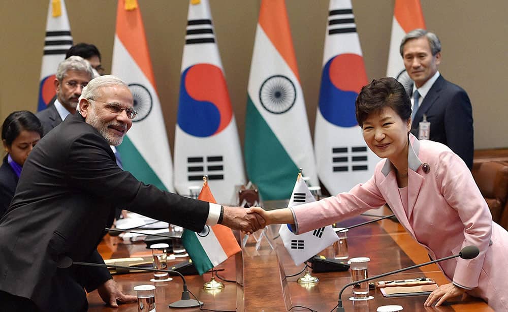 Prime Minister Narendra Modi shakes hands with South Korean President Park Geun-hye during a delegation level talk at Cheong wa Dae, Seoul, South Korea.