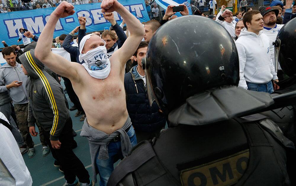 Zenit's fans celebrate Zenit winning the national soccer Championship prior a match against Ufa at Petrovsky stadium in St.Petersburg, Russia.