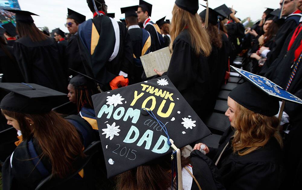 Graduates are seated during George Washington University's commencement exercises on the National Mall, in Washington. 