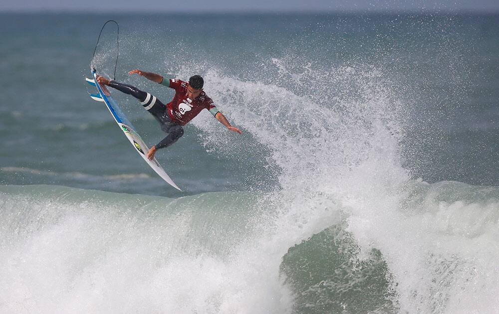 Brazil's Filipe Toledo surfs to win the final of the World Surf League (WSL) Rio Pro championship in Rio de Janeiro, Brazil.