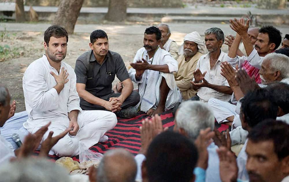 Congress Vice President Rahul Gandhi interacting with farmers at a village in Amethi.
