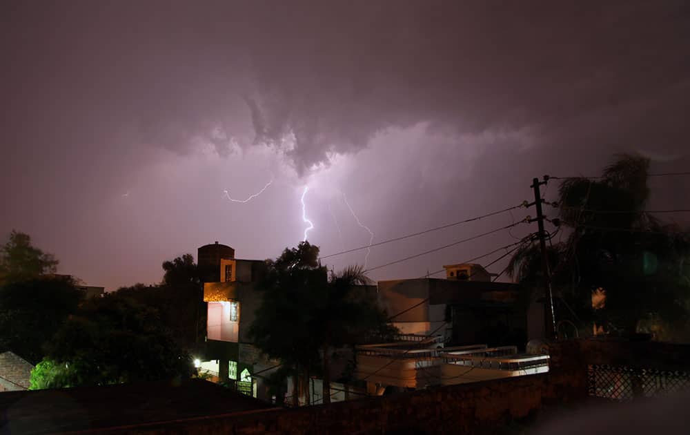 bolt of lightning illuminates the night sky in Jammu, India. People of the city witnessed a brief respite from the blistering hear after Sunday’s summer storm and rain, according to local reports.