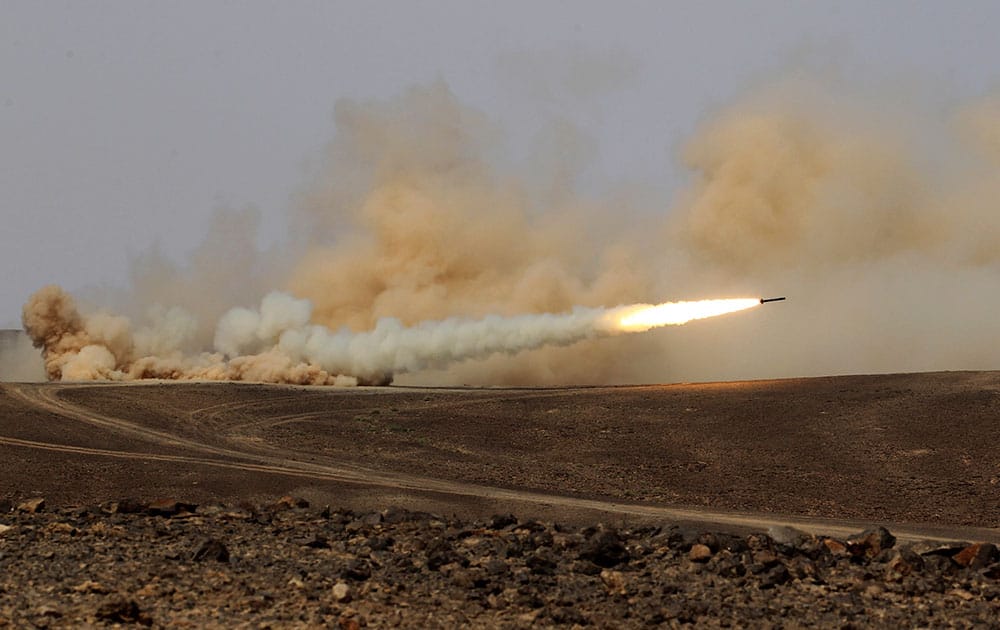 A rocket is fired during 18-nation military exercises in a field near the border with Saudi Arabia, in Mudawara, 280 kilometers (174 miles) south of Amman, Jordan.