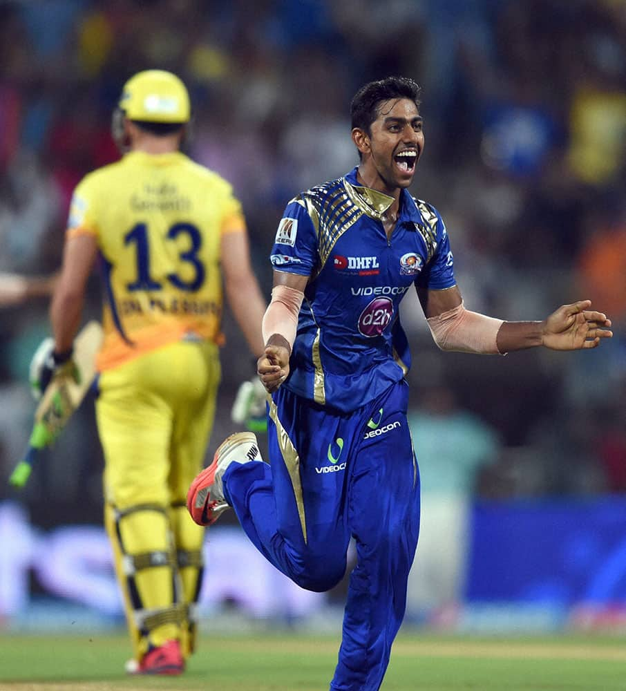 Mumbai Indians player J Suchith celebrate the wicket of CSKs DU Plessis during the first qualifier match of IPL in Mumbai.