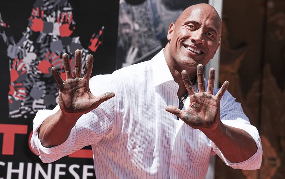 Dwayne Johnson poses at his Hand And Footprint Ceremony held at the TCL Chinese Theatre in Los Angeles.