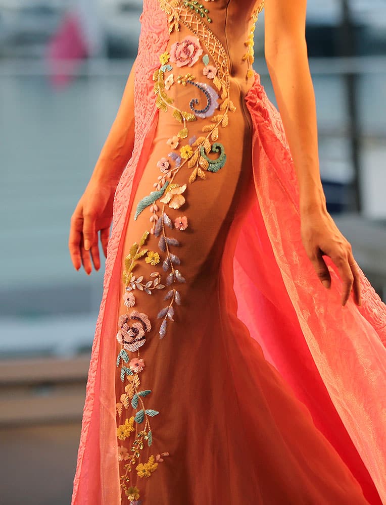 A model displays a creation by the Emirati designer Mona al-Mansouri of her Spring-Summer 2015 fashion show during the summer fashion week at Saint George Yacht Club in Beirut, Lebanon.