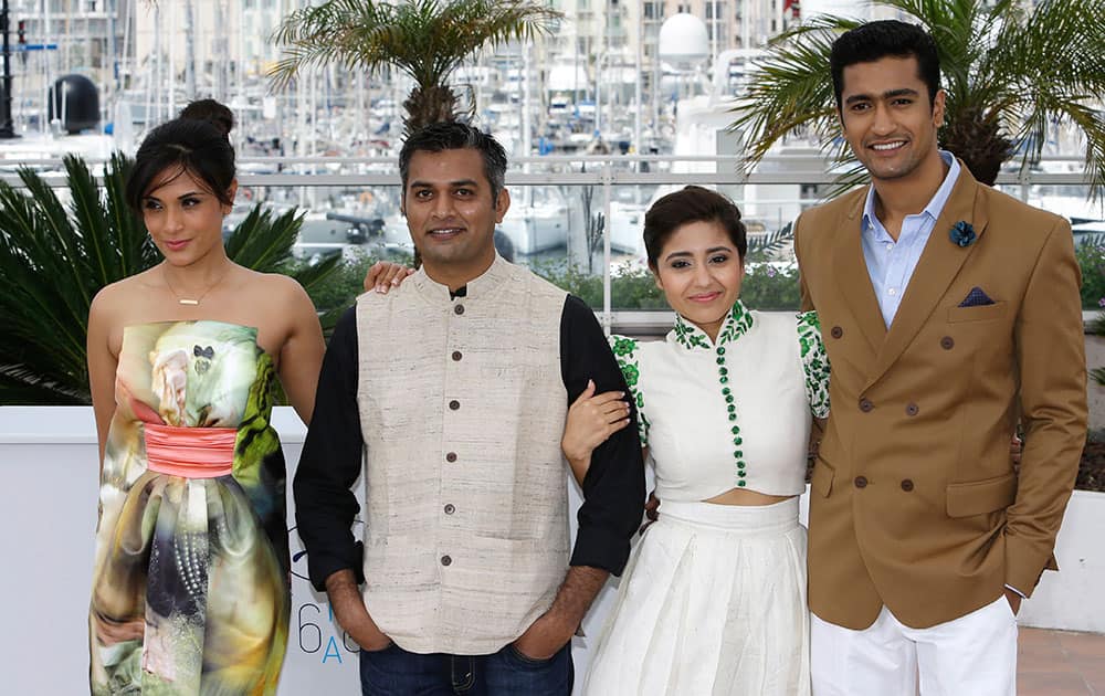 From left, actress Richa Chadda, director Neeraj Ghaywan, actress Shweya Tripathi and Vicky Kaushal pose for photographers during a photo call for the film Masaan, at the 68th international film festival, Cannes.