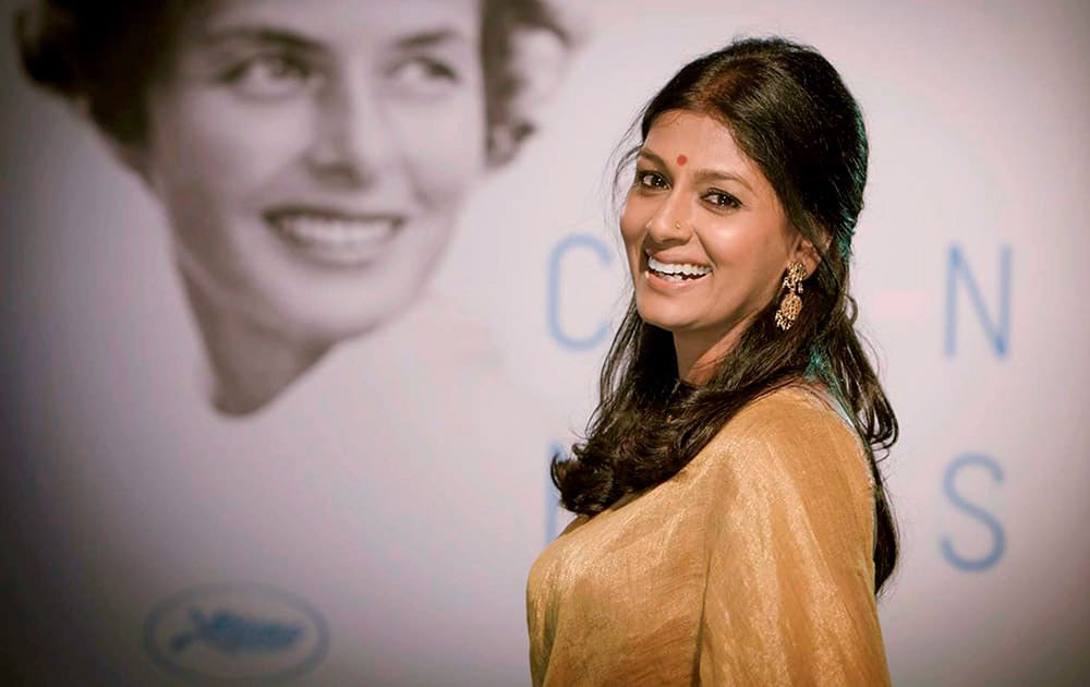 Nandita Das stand in front of a poster of Ingrid Bergman at Cannes Film Festival. The poster was chosen this year to pay tribute for her contribution to film.