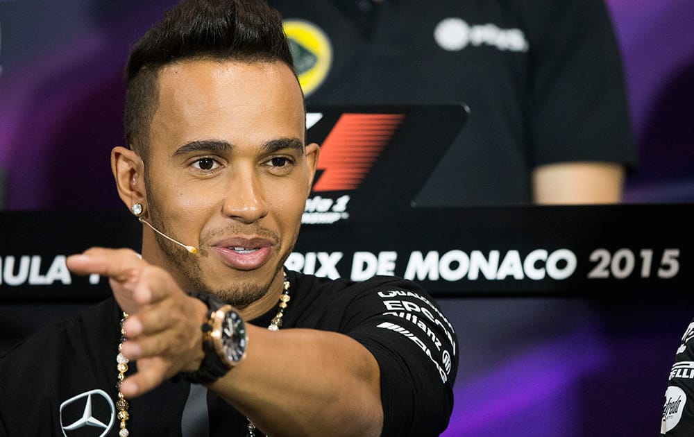 Mercedes driver Lewis Hamilton of Britain gestures during the official news conference prior to the Formula One Grand Prix, at the Monaco racetrack, in Monaco.