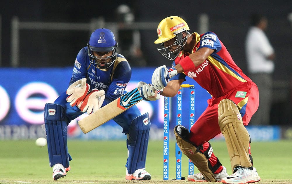 Mandeep Singh of the Royal Challengers Bangalore plays a shot during the eliminator match of the IPL against Rajasthan Royals at the MCA International Stadium in Pune.