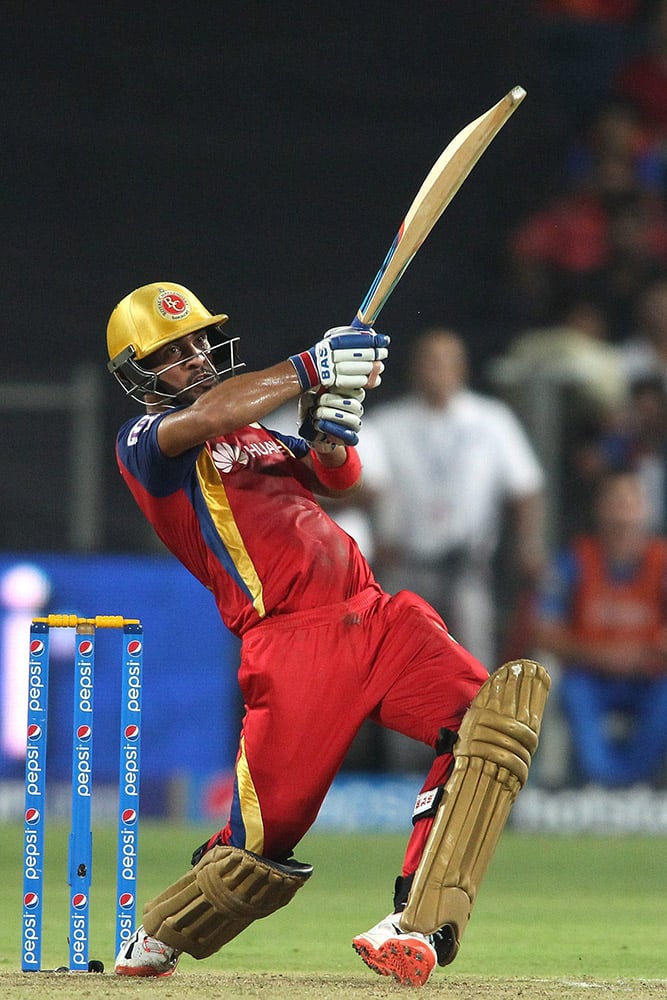 Mandeep Singh of the Royal Challengers Bangalore plays a shot during the eliminator match of the IPL against Rajasthan Royals at the MCA International Stadium in Pune.