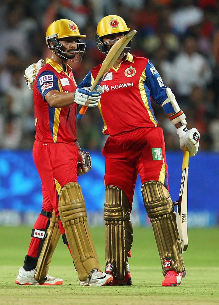 Mandeep Singh of the Royal Challengers Bangalore celebrates his fifty during the eliminator match of the IPL 2015 against Rajasthan Royals at the MCA International Stadium in Pune.