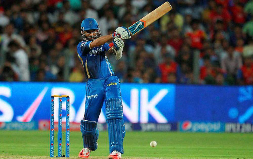 Ajinkya Rahane of the Rajasthan Royals plays a shot during the eliminator match of the IPL 2015 against Royal Challengers Bangalore at the MCA International Stadium in Pune.