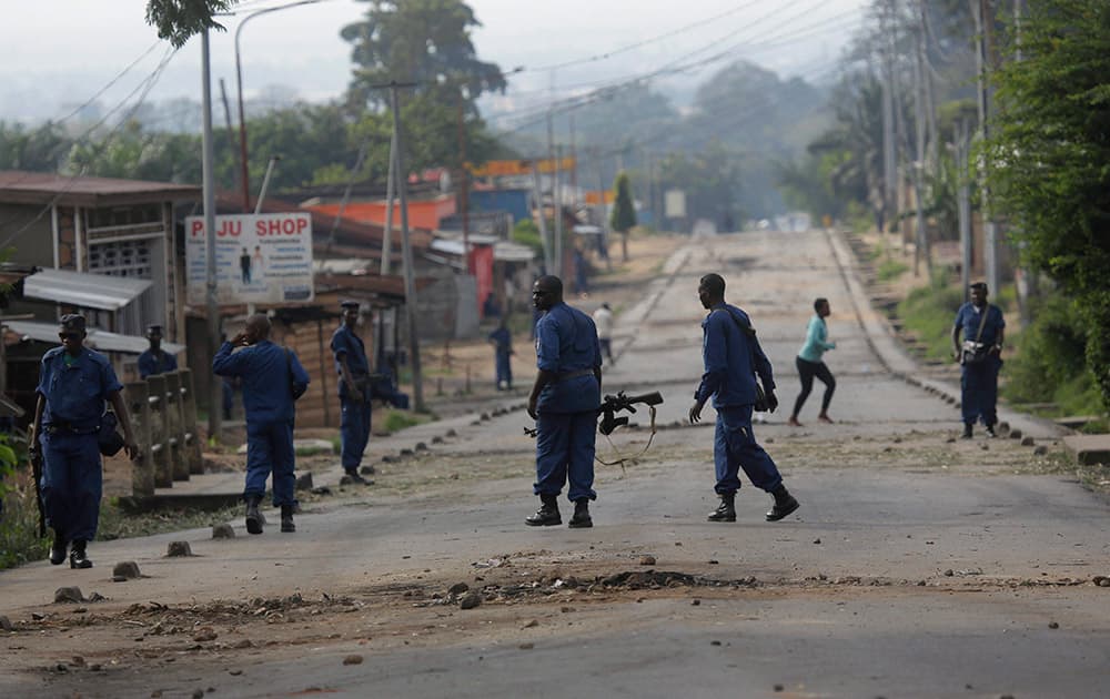 Police patrol the Musaga neighborhood.