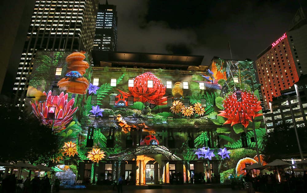 A garden scene is projected onto Customs House as part of the Vivid festival in Sydney.