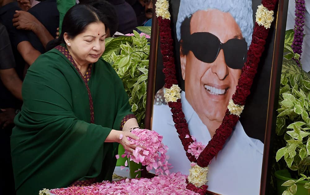 AIADMK General Secretary Jayalalithaa paying floral tribute at former chief minister and party founder MGRs statue in Chennai. Jayalalithaa was seen in public for the first time on Friday after her acquittal in the disproportionate assets case a week earlier.