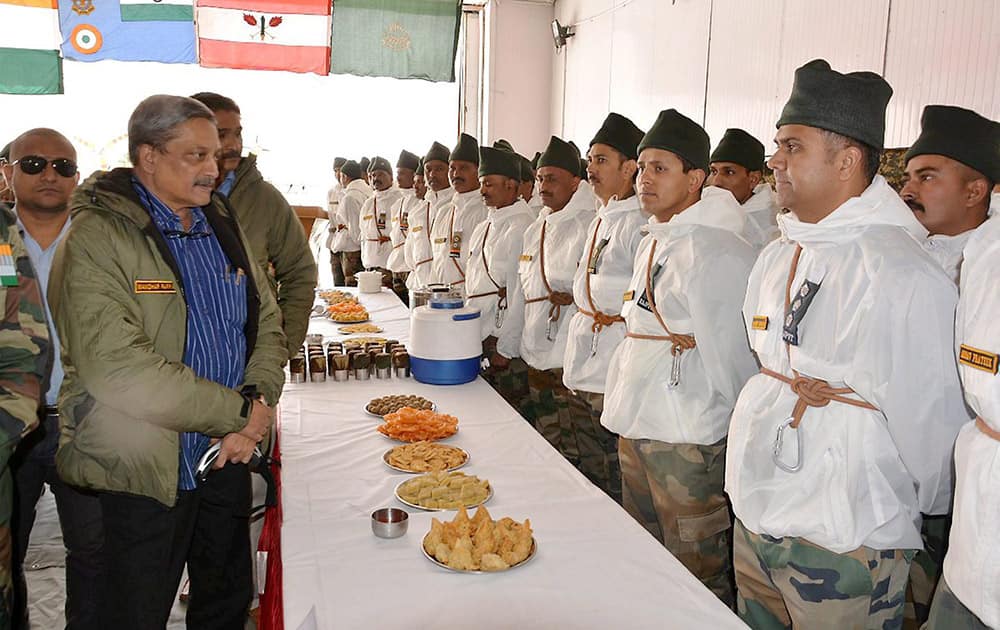 Defence Minister Manohar Parrikar interacts with the Army soldiers at the Siachen base camp in Nubra area of Jammu & Kashmirs Ladakh region.