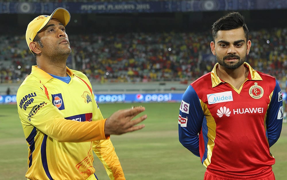 Chennai Super Kings captain MS Dhoni and Royal Challengers Bangalore captain Virat Kohli at the toss of the 2nd qualifier match of the IPL 8 in Ranchi.