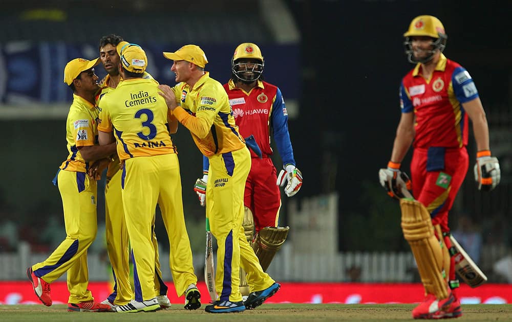 Chennai Super Kings players celebrate a wicket Royal Challngers Bangalores batsman during the 2nd qualifier match of IPL 8 at Ranchi.