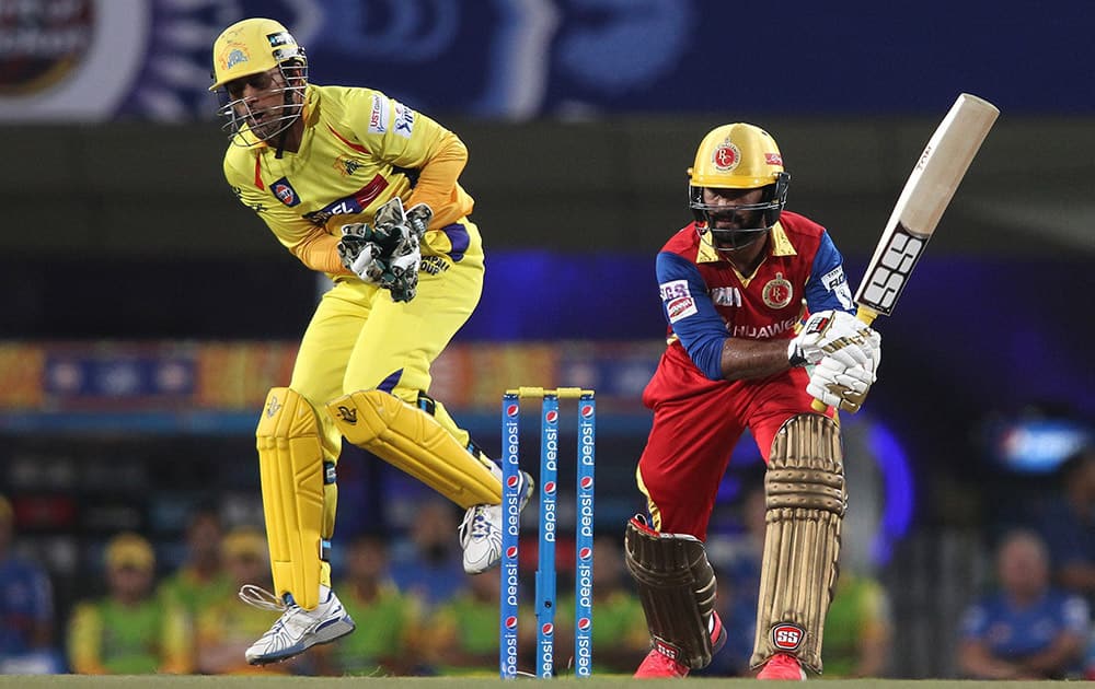 Dinesh Karthik of Royal Challengers Bangalore plays a shot against Channai Super Kings during 2nd qualifier match of IPL 8 at Ranchi.