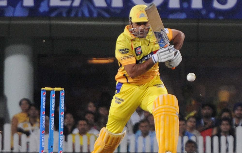 Chennai Super Kings M S Dhoni plays a shot against Royal Challngers Bangalore during the 2nd qualifier match of IPL 8 at Ranchi.