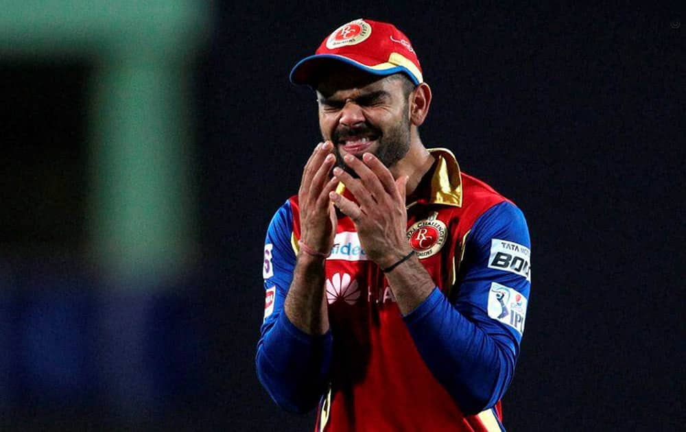 Royal Challengers Bangalore captain Virat Kohli reacts to a boundary off the second last over during the 2nd qualifier match of the IPL 8 against Chennai Super Kings at Ranchi.