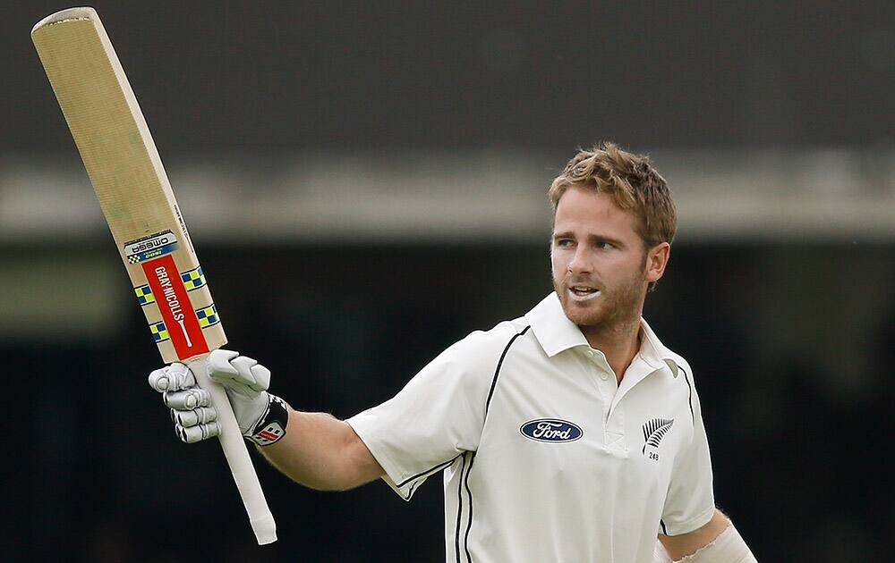 New Zealand's Kane Williamson celebrates scoring a century during the third day of the first Test match between England and New Zealand at Lord's cricket ground in London.