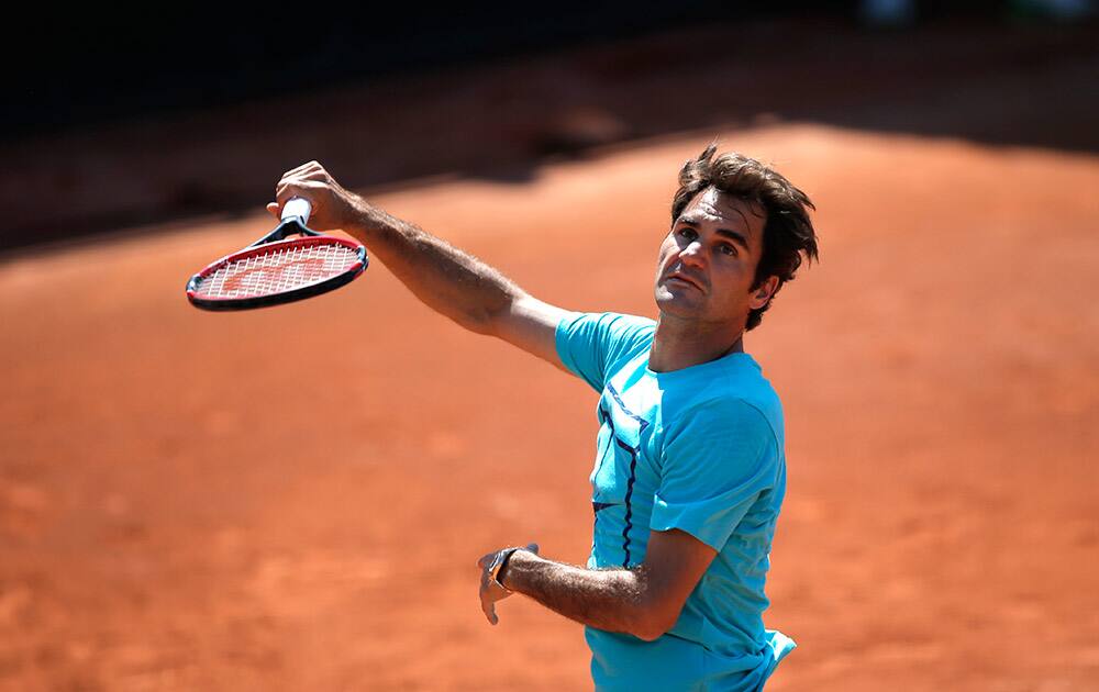 Switzerland's Roger Federer practices during a training session for the French Tennis Open at the Roland Garros stadium, in Paris.