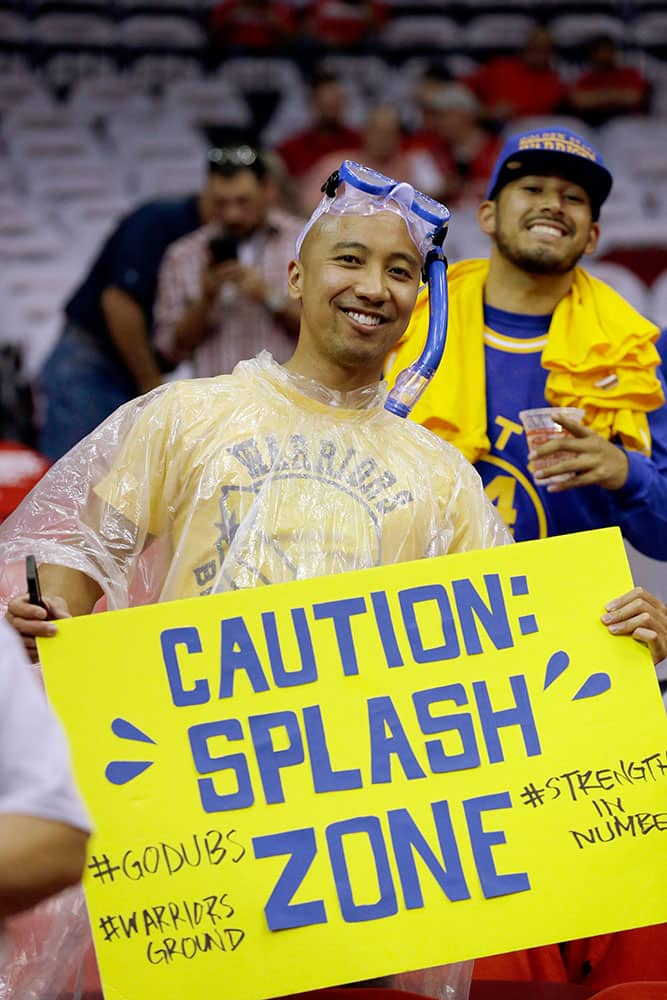 A Golden State Warriors fan shows his support before Game 3 of the NBA basketball Western Conference finals against the Houston Rockets.