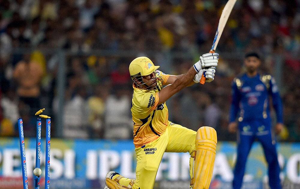 Chennai Super Kings captain M S Dhoni bowled by Mumbai Indians bowler L Malinga during the IPL final match at Eden Garden in Kolkata.