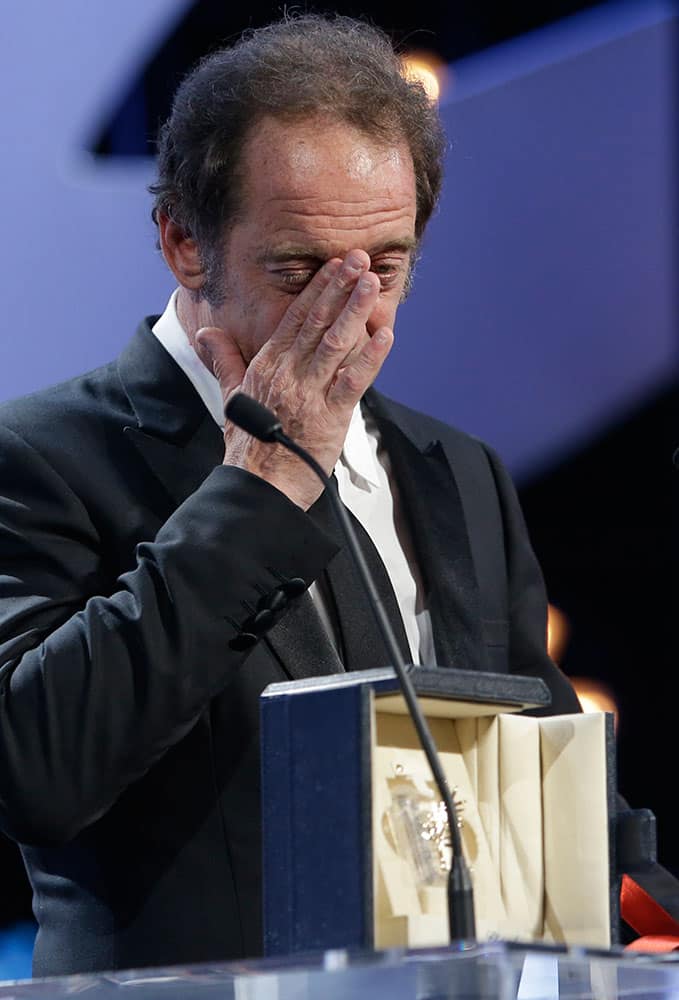 Actor Vincent Lindon reacts as he receives the Best Actor award for the film The Measure of a Man during the awards ceremony at the 68th international film festival, Cannes.