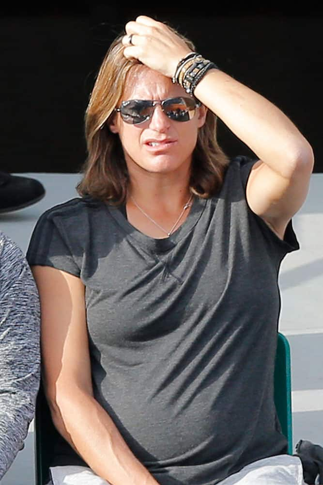 Amelie Mauresmo of France, former tennis player and now coach of Britain's Andy Murray, watches his first round match of the French Open tennis tournament against Argentina's Facundo Arguello.