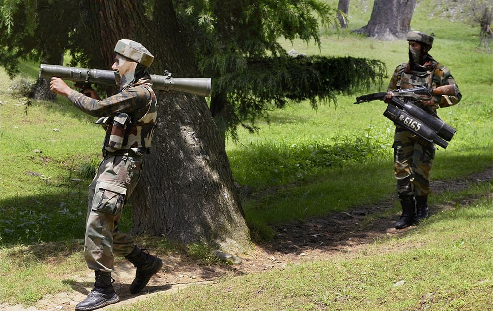 Army personnel in action during an encounter with militants near Line of Control (LoC) in the Tangdhar area of Kupwara district.