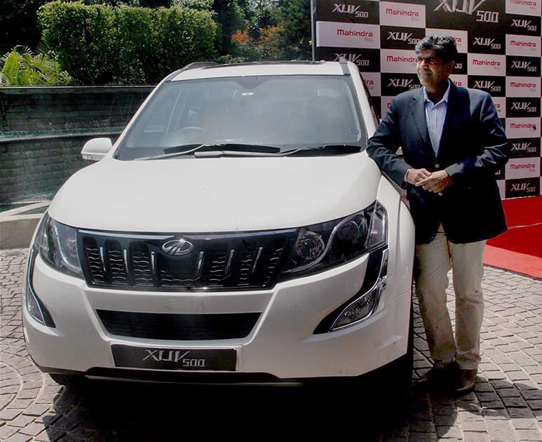 Senior Vice President, Sales and customer care, Automotive Division, Mahindra and Mahindra, Vijay Nakra launching The New Age XUV 500 in Bengaluru.