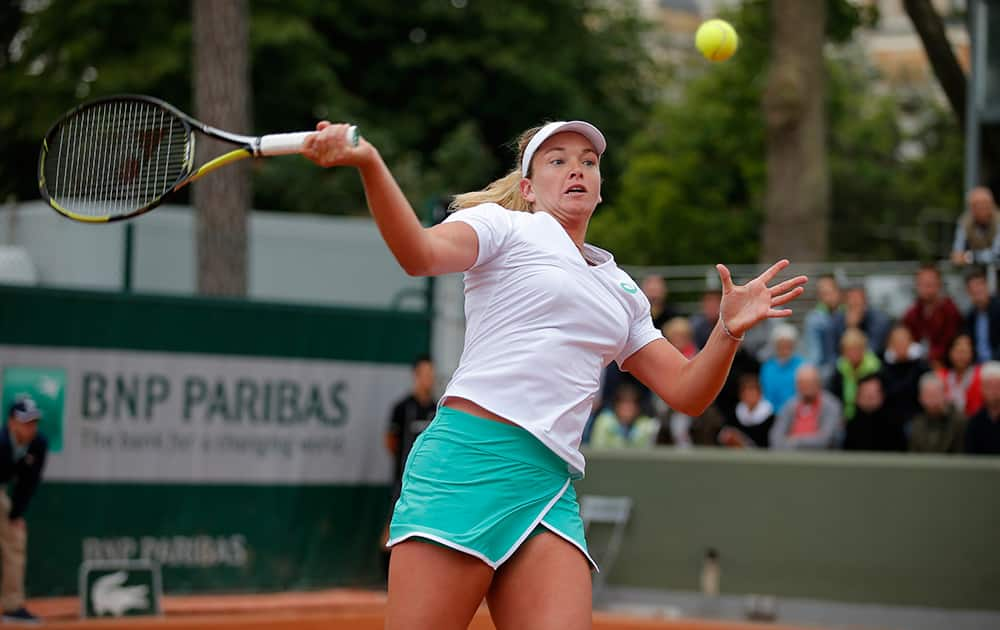 USA's Coco Vandeweghe returns the ball to Germany's Julia Goerges during their first round match of the French Open tennis tournament at the Roland Garros stadium in Paris. 