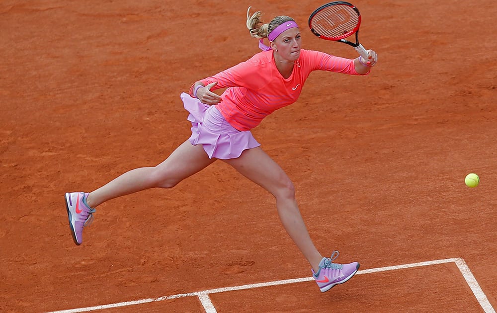 Petra Kvitova of the Czech Republic returns in the first round match of the French Open tennis tournament against Marina Erakovic of New Zealand at the Roland Garros stadium, in Paris, France.